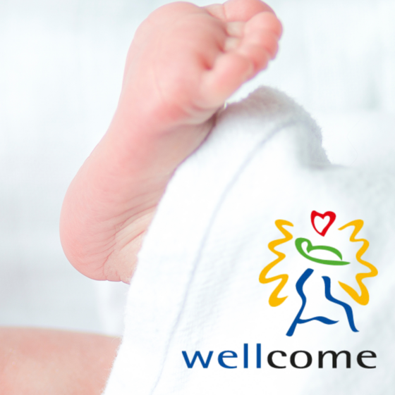 Babyfüße und das Logo von wellcome